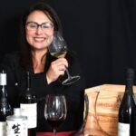 Cynthia Headshot with Wine